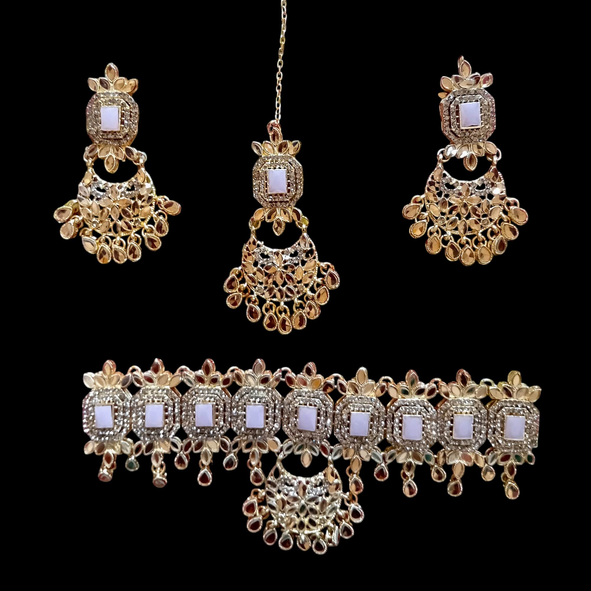 Buy Pink and Golden colour jewellery set with necklace , earrings and tikka at best price in Pakistan